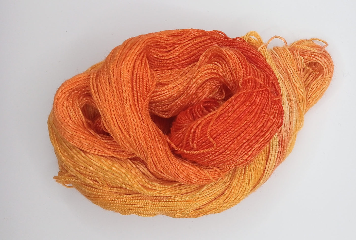 100G hand dyed Bluefaced Leicester/Nylon High Twist sock yarn - "Tequilla Sunrise"